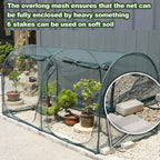 EXXO 8x4x4ft greenhouse showing staked-down setup on soil for stability